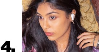 Woman wearing Bose QuietComfort Earbuds II