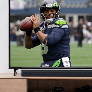 NFL game shown on a TV
