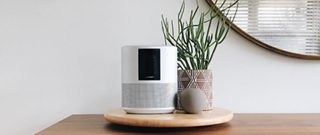 Bose Home Speaker 500 on a table in a home