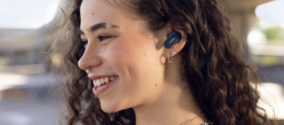 Woman wearing Bose QuietComfort Earbuds II