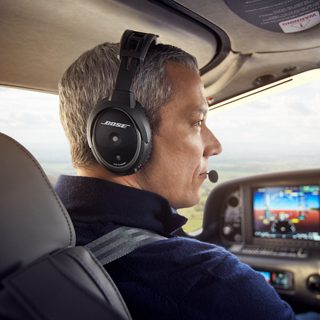 Pilot using the Bose A20 Aviation Headset