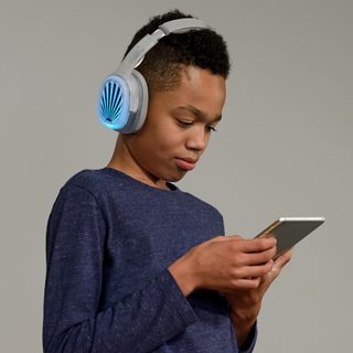 Boy using BOSEbuild Headphones