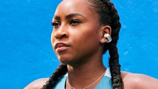 Coco Gauff wearing Bose Ultra Open Earbuds