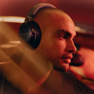 Man wearing Bose QuietComfort Ultra Headphones (2nd Gen).
