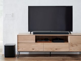 Bose Soundbar 700 with a TV and the Bose Bass Module 700