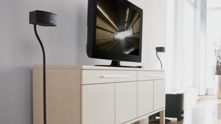 Bose speakers displayed on UFS-20 Series II universal floorstands