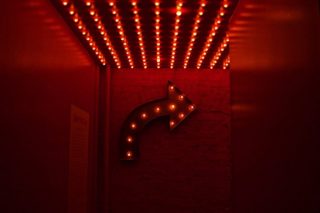 A room with red lighting and red walls