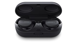 Triple Black Bose Sport Earbuds in the charging case
