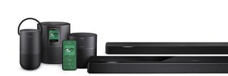 Bose Portable Home Speaker, Bose Home Speaker 500, Bose Home Speaker 300, Bose Soundbar 500, and the Bose Soundbar 700 with a smartphone