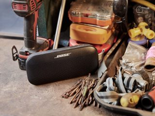 SoundLink Flex Bluetooth speaker on a workbench