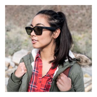 Woman hiking wearing Bose Frames Alto