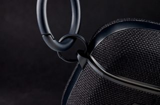 Close-up showing the metal clasp of the QuietComfort Earbuds II Fabric Case