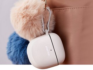 QuietComfort Earbuds II Silicone Case Cover attached to a purse