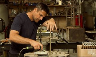 Mark Jupiter buffing the brass pedestal of the 901 Speaker