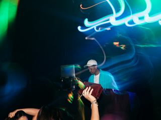 Jakob Nowell with the Diamond 60th Edition Bose QuietComfort Ultra Headphones around his neck