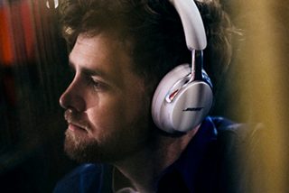 Alex Warren wearing Bose QuietComfort Ultra Headphones (2nd Gen)