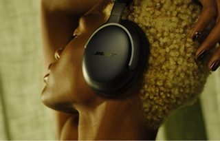 Woman wearing Bose QuietComfort Ultra Headphones